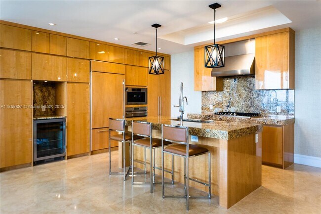 Building Photo - 9701 Collins Ave