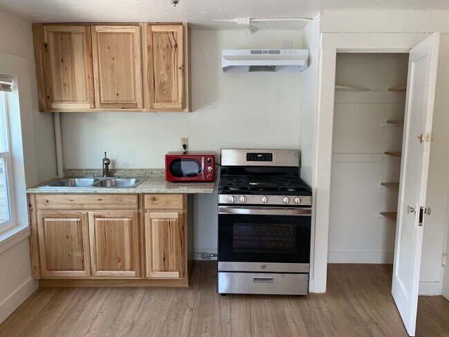 New cabinets, pantry, upgraded gas range - 547 Ralston St