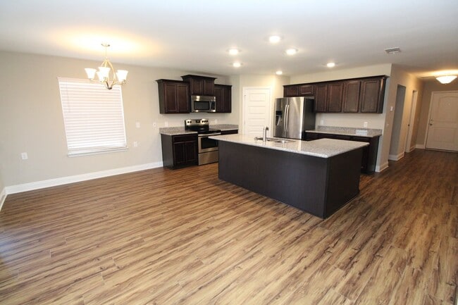 Building Photo - Coming Soon! 3-Bed/2-Bath Brick Home in Mi...