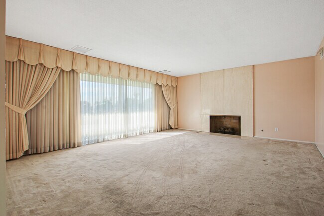 LIVING ROOM W/ FIREPLACE - 5443 W Slauson Ave