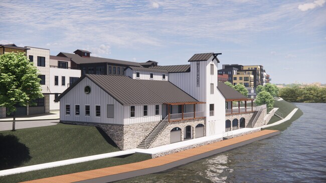Vista proyectada de la casa club y el muelle a lo largo del canal. - Westport Crossing