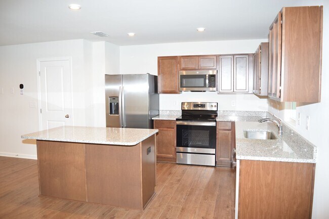Foto del edificio - Modern 3-Bedroom Townhome in Desirable Bear Park