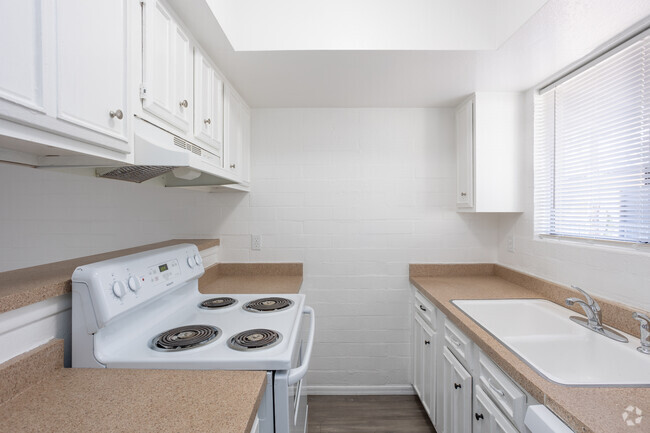 2BR, 1BA - 850SF - Kitchen - Palm Garden Apartments