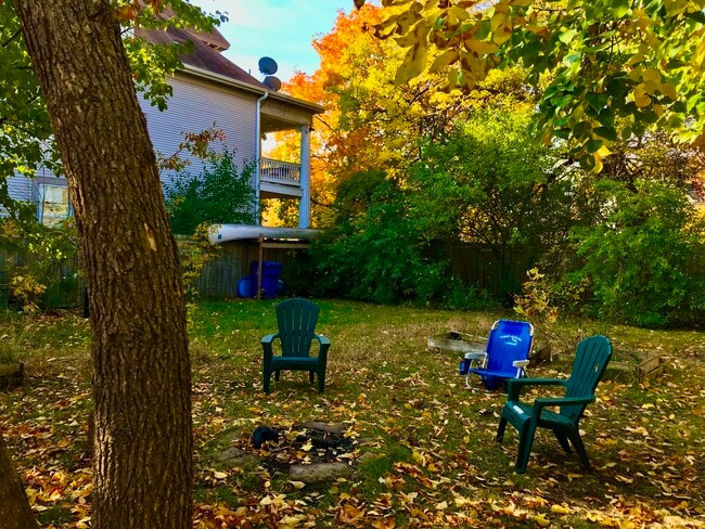The backyard is perfect for gardening and pets. - 611 E 27th St