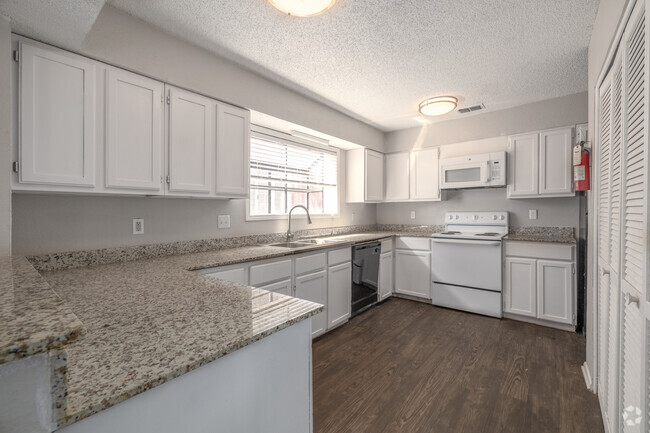 2BR, 2BA Kitchen - The Village at Turtle Cove