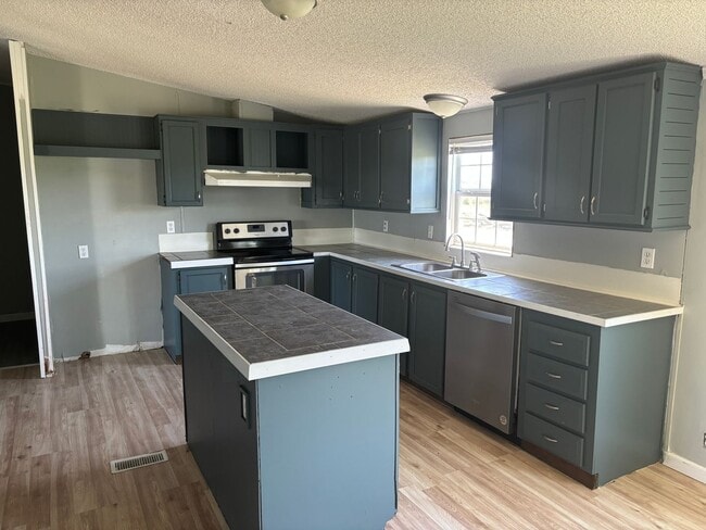 Building Photo - 3/2 On Large Lot on Highway 11!