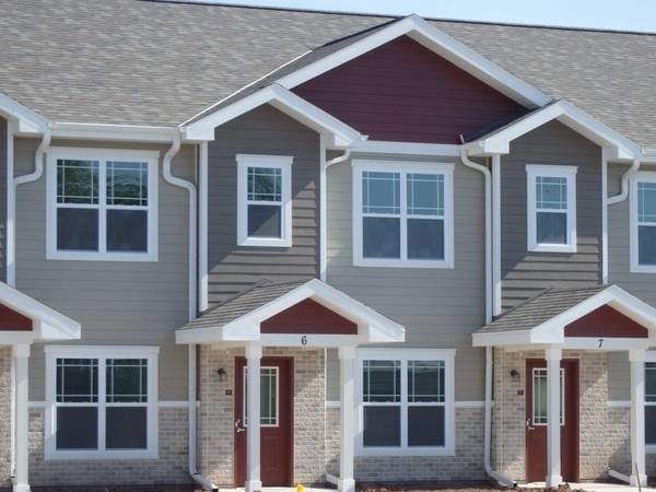 Building Photo - Whispering Echoes Townhomes