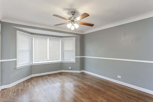 Front Room. Walls are white - 8122 S Kingston Ave