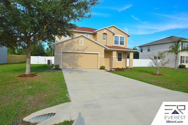 Building Photo - SPACIOUS, FULLY FENCED 4/2.5/2 IN DESIRABLE MATANZAS WOODS