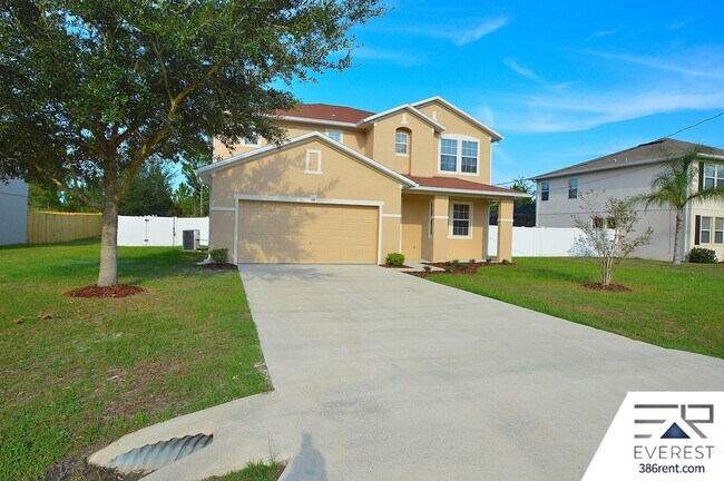 Foto del edificio - SPACIOUS, FULLY FENCED 4/2.5/2 IN DESIRABLE MATANZAS WOODS