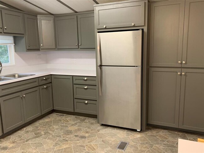 Building Photo - 6432 Longmire Rd