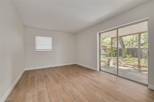 Building Photo - 7116-7120 Oakwood Dr