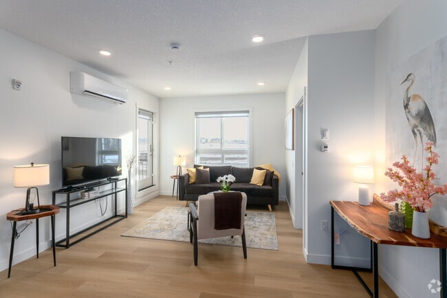 2BR, 2BA w/ Den - Living Room - Orchards 66