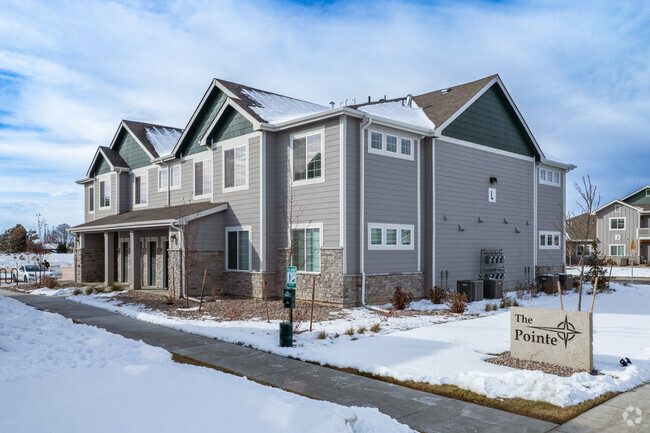 Apartments and Sign - The Pointe Apartments