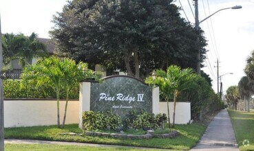 Building Photo - 5860 Whispering Pine Way