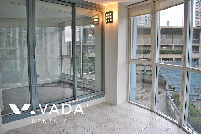 Photo du bâtiment - Paris Place 2 Bedroom Apartment For Rent 7...