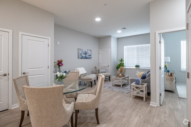 1BR, 1BA w/Den - 852SF - Dining/ Living Room - The Landings at Riverwalk