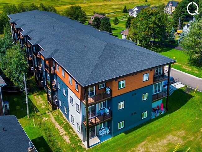 Photo du bâtiment - Riverain