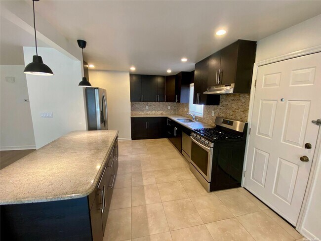 Building Photo - 259-15 57th Ave