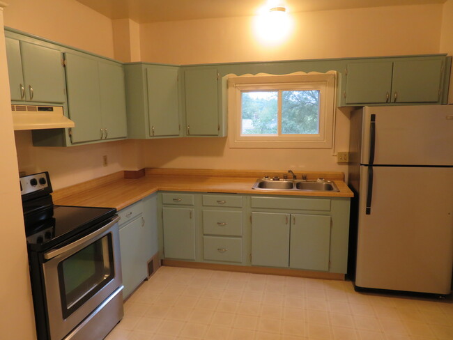 Kitchen with Range & Refrigerator - 203 Main St