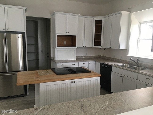 Foto del edificio - 4 br, 3 bath House - 4456 Luke Avenue