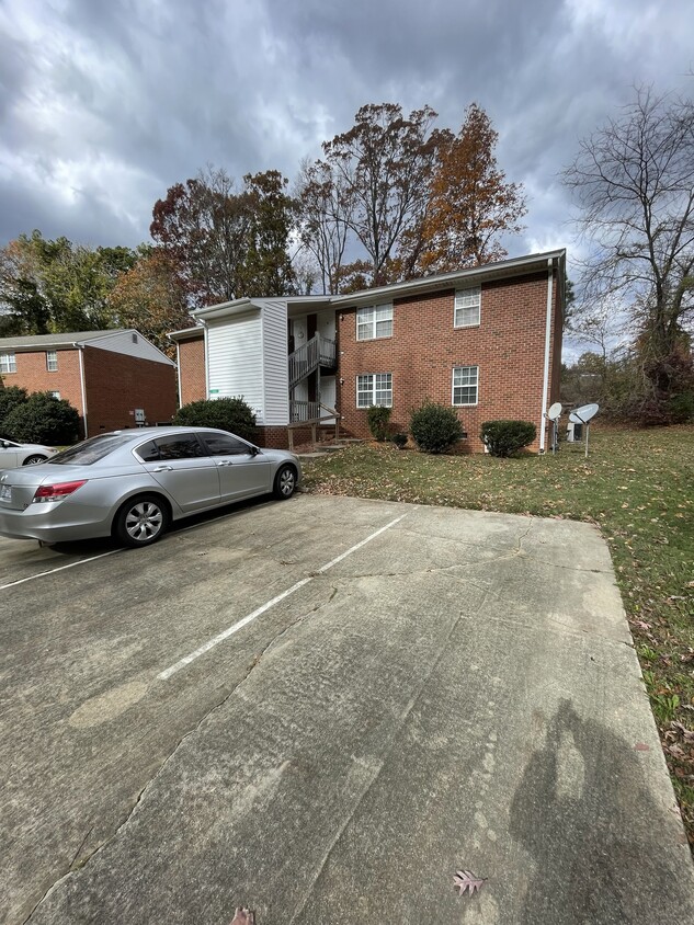 Brick building with paved parking - 104 Hunters Ct