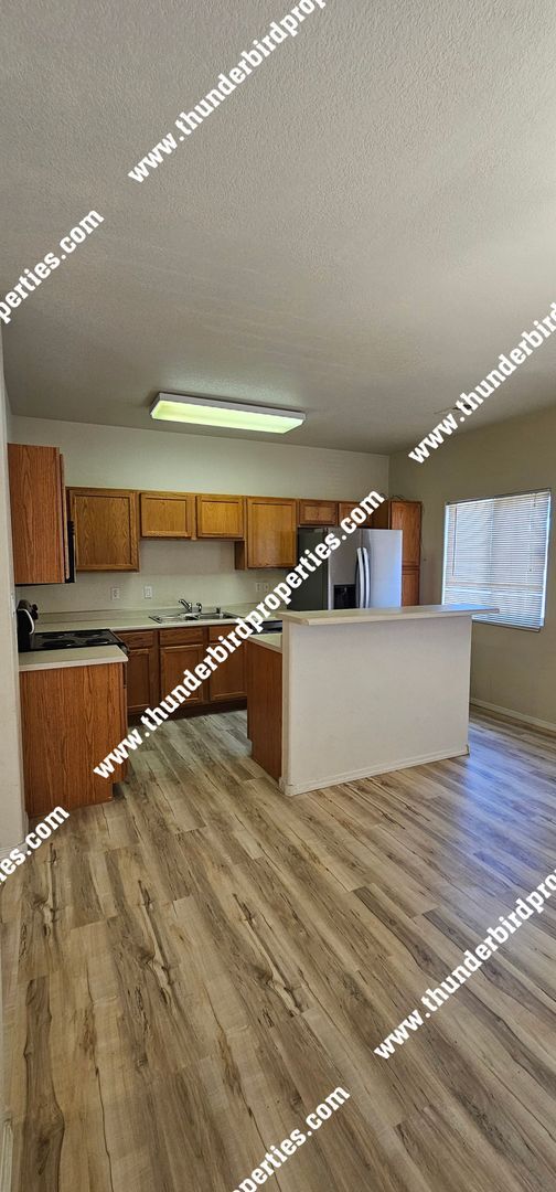 Building Photo - Gated Community 2 Bedroom, 2.5 Bathroom, 2 Car Garage, Upstairs Loft & Backyard. Available NOW!