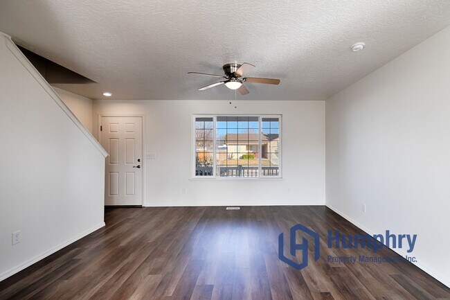 Building Photo - Like new four bedroom family home located in Sego Prairie Farms Subdivision