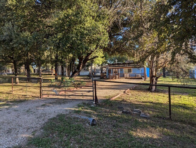 Building Photo - PRICE DROPPED HOLIDAY SPECIAL - Covered pa...