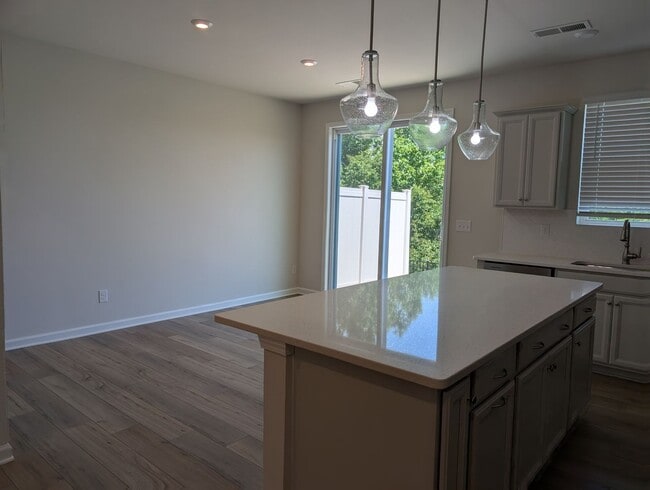 Building Photo - Elegant, Move In ready townhome located in...