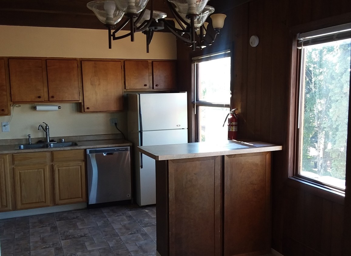 so much light & an island/breakfast bar, too - 512 E 15th Ave