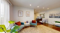 Located at 33 Wedgewood Dr in Carteret, NJ, this two-floor residence offers a thoughtfully designed layout spread across a generous total footprint. The ground floor serves as a welcoming, multi-functional space featuring multiple living areas with recessed lighting, warm hardwood flooring, and clean white walls accented by curated artwork. A dedicated reception-style area with a dark wood desk and seating transitions seamlessly into comfortable lounge spaces, making the lower level highly versatile. The kitchen is well-equipped with rich dark cabinetry, granite countertops, stainless steel appliances including a refrigerator, dishwasher, and gas range, light wood-look flooring, and a window that brings in natural light. The upper floor houses the spacious primary bedroom, distinguished by a soothing sage green accent wall, rich hardwood floors, two closets, and multiple windows dressed with sheer curtains that allow ample natural light. A full bathroom on this level features a tiled tub-shower combo with a frosted window for privacy. An additional living area on the upper floor with sliding door access and soft blue-gray walls rounds out the home, offering flexible use of space throughout.