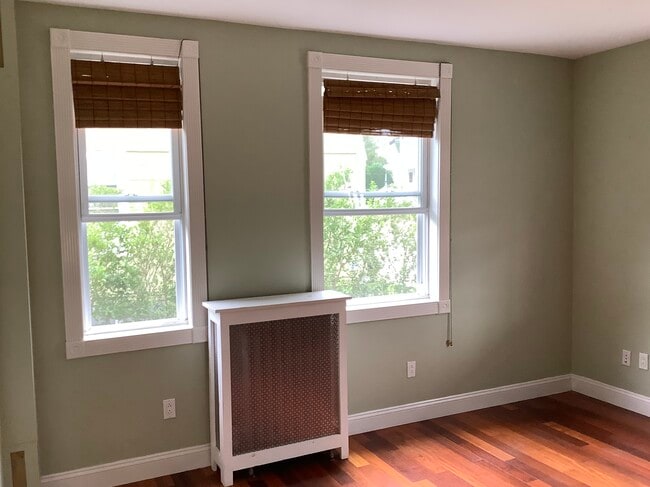 The living room measures 13’6” by 12’10”. - 9 Jay St