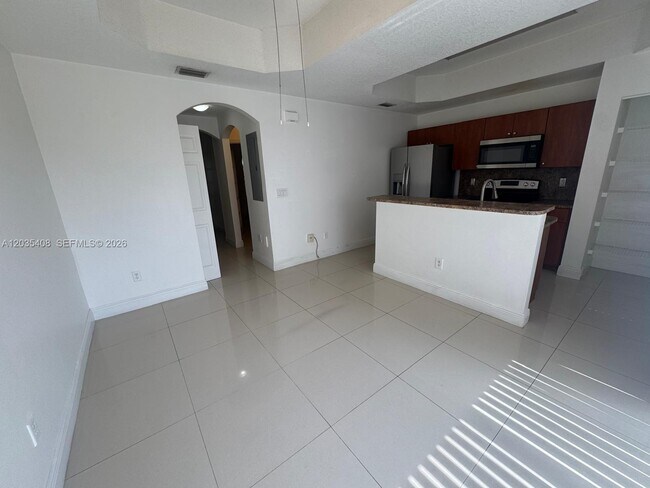 Foto del edificio - 4941 Tradewinds Ter