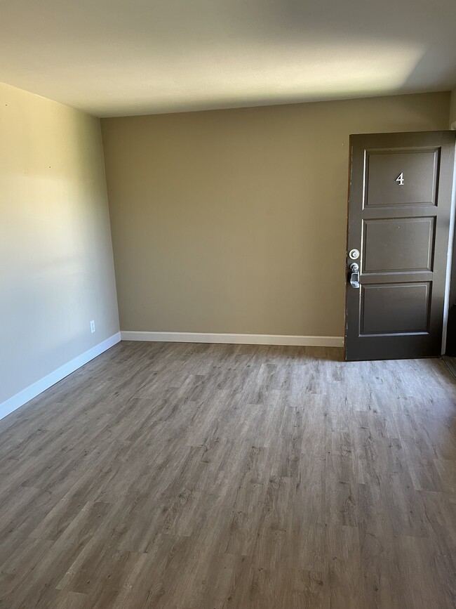 Living room, see the newer floors - 9204 Lackland Rd