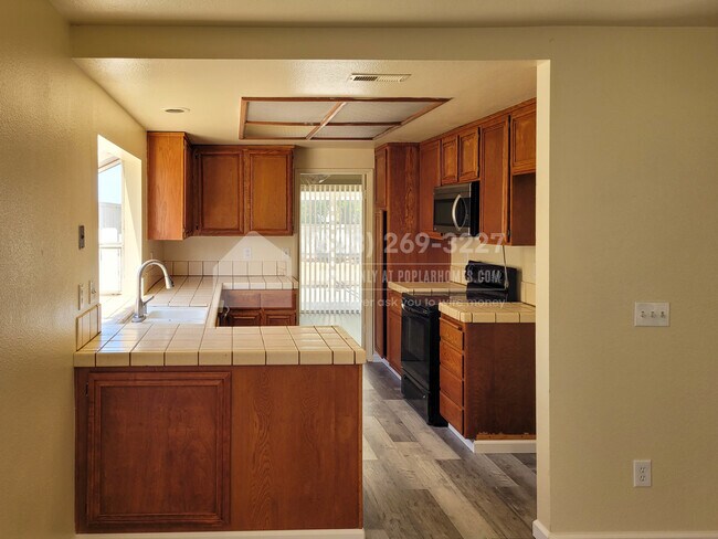 Building Photo - 6423 Garza Ct