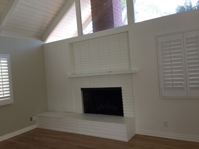LR fireplace, wood floors throughout - 417 30th St