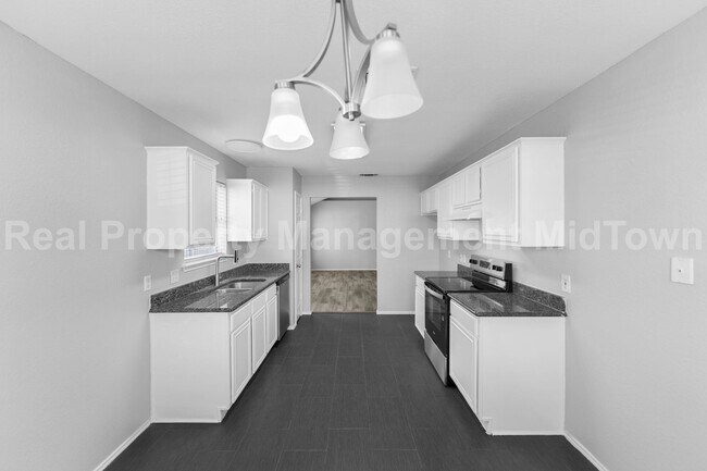 Building Photo - 6100 Wall St