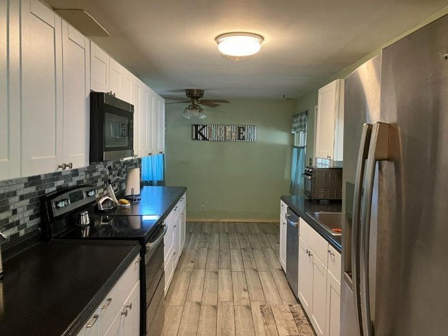 Building Photo - 9029 Green Meadow Dr
