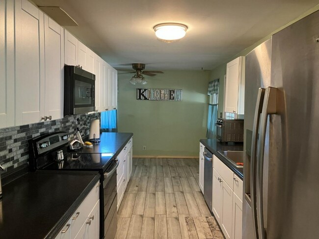 Foto del edificio - 9029 Green Meadow Dr