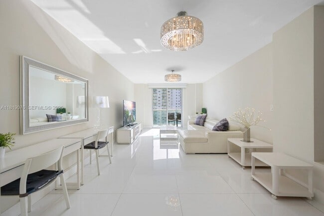 Building Photo - 19370 Collins Ave