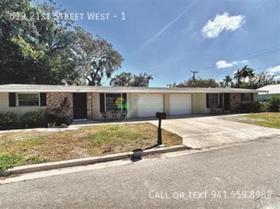 Photo - 619 21st Street West - 1- House