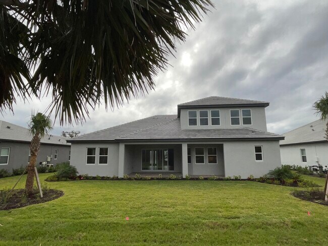 Back - 6133 Lungo Lago Dr