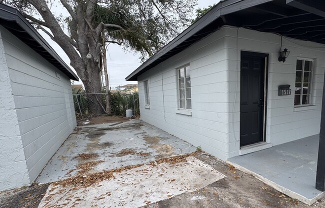 Concrete pad next to unit for private parking - 1512 13th St W