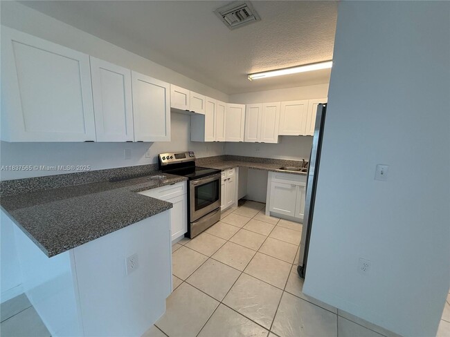 Building Photo - 26063 SW 138th Ct