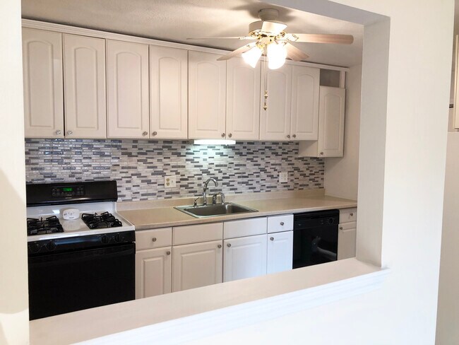 Newly refreshed kitchen. - 395 Merrimack St