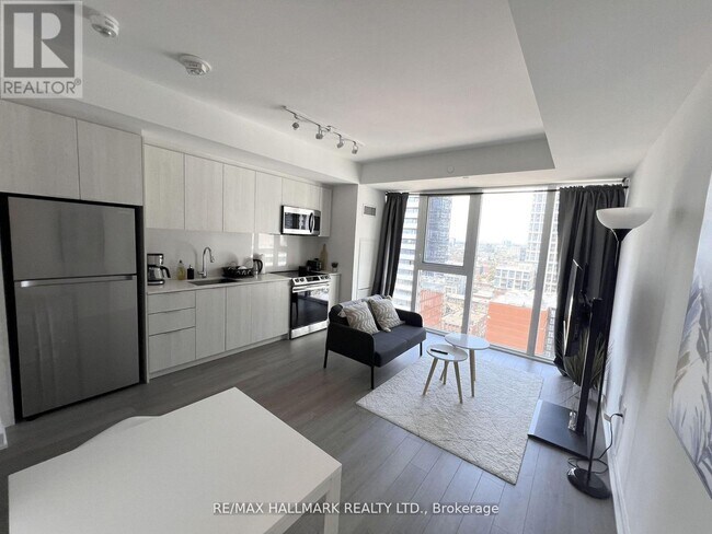 Photo du bâtiment - 357-2357 King St W