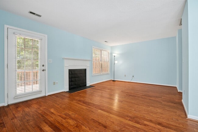 Building Photo - Price Drop + $500 OFF First Month's Rent! Woodcroft End of Unit Townhouse with Large Bedrooms