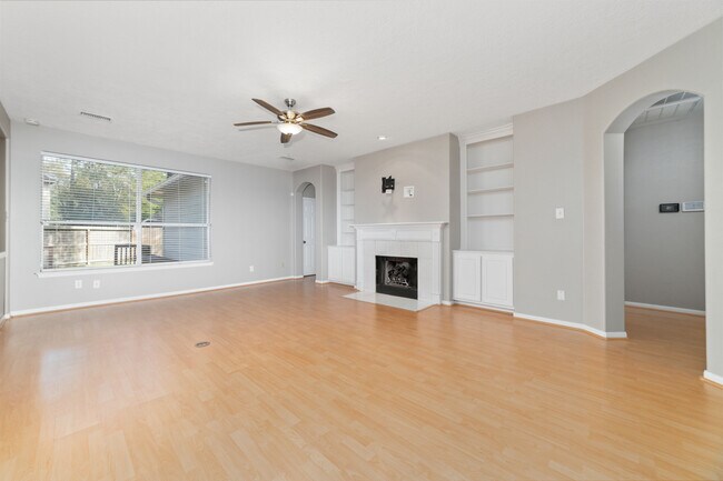 Large living room with built in Bookcases, ceiling fan and fresh paint - 6 Leaf Spring Pl
