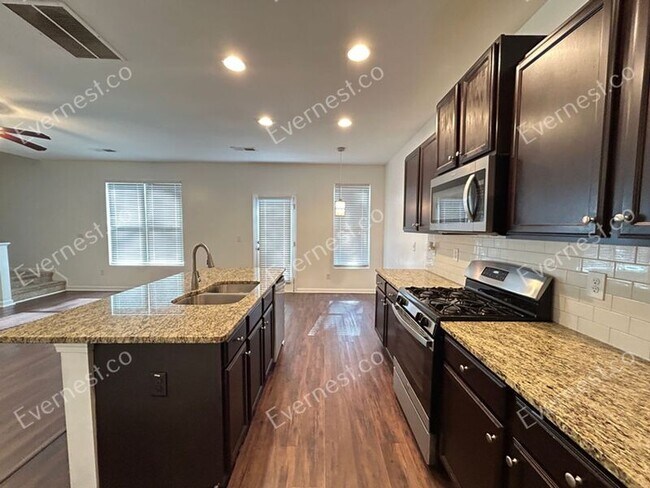 Foto del edificio - 5876 Grande River Rd